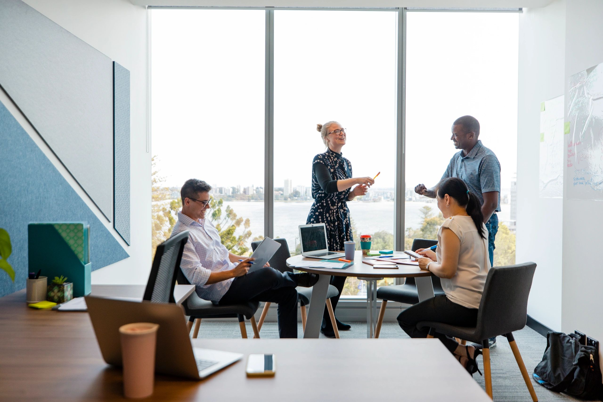 Business team brainstorming around a desk