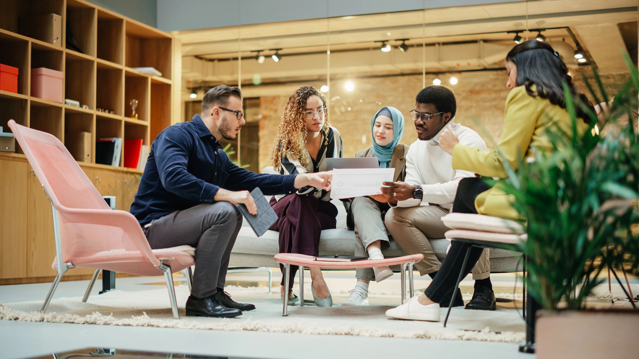 Startup team preparing a presentation in a conference room